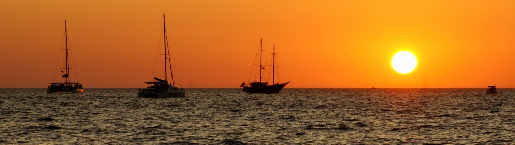 Boats watching sun set